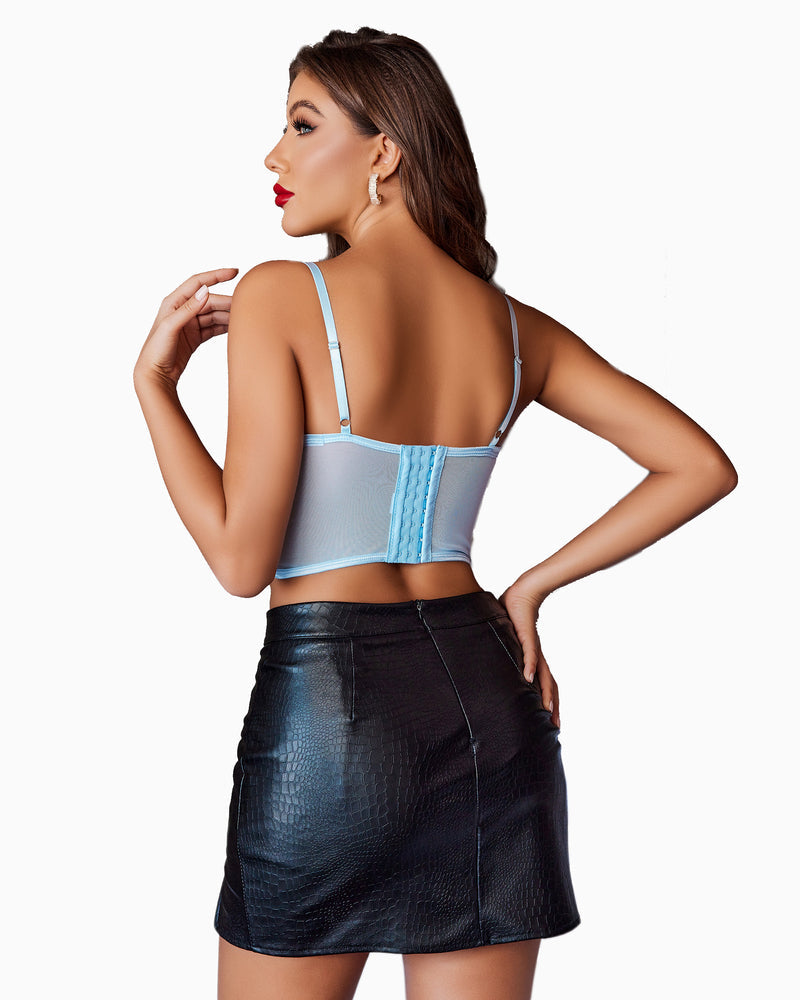 Mesh bustier with adjustable straps, and black leather skirt. Slim fit, perfect for a night out.