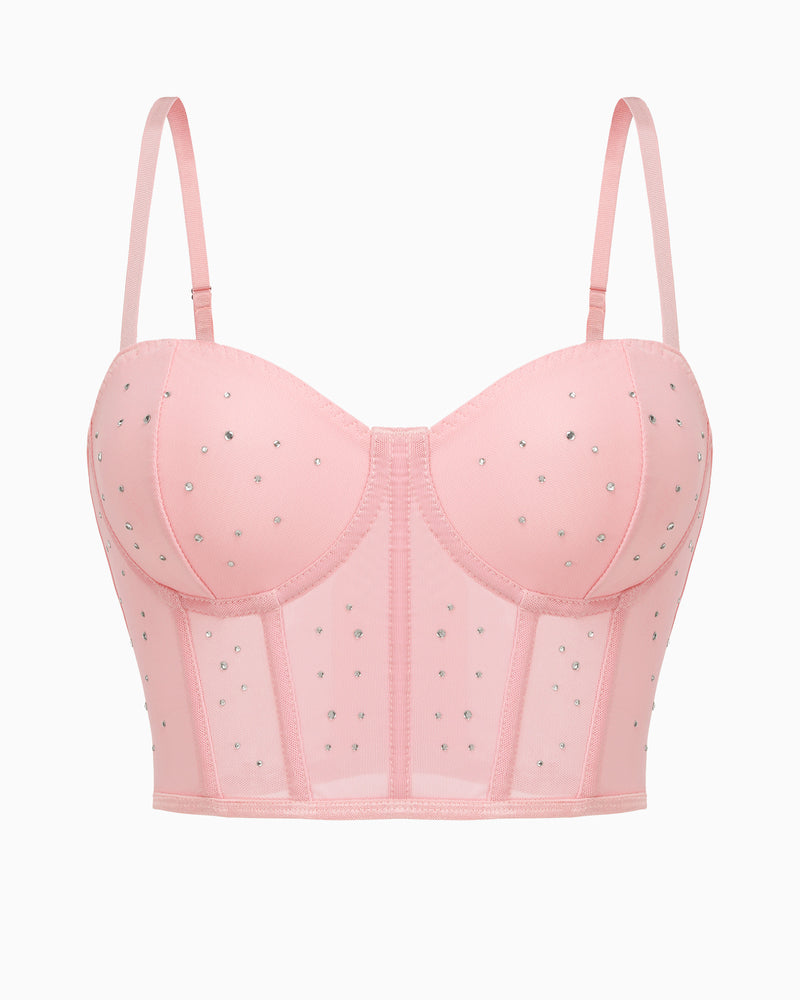 Pink rhinestone corset top with adjustable straps and mesh detail. Sexy bustier for nights out.