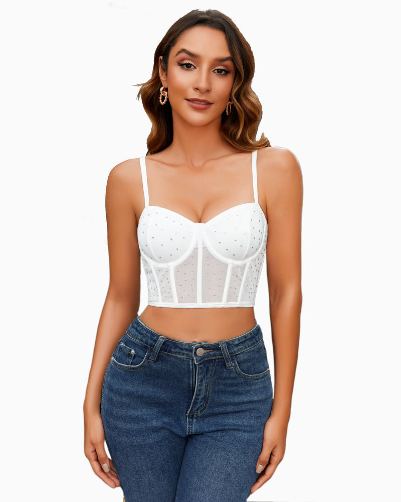 White rhinestone bustier top with mesh and adjustable straps, for a night out. Clubbing outfit idea.