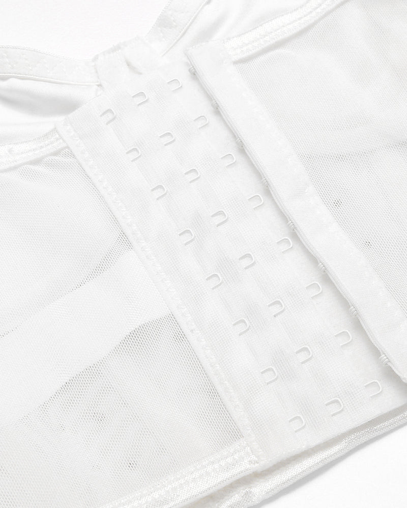 White bustier top with hook and eye closure. Adjustable straps, slim fit club top from Avidlove.