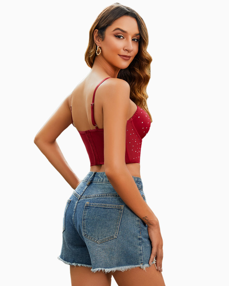 Burgundy rhinestone corset top with denim shorts. Slim fit bustier, ideal for nights out.
