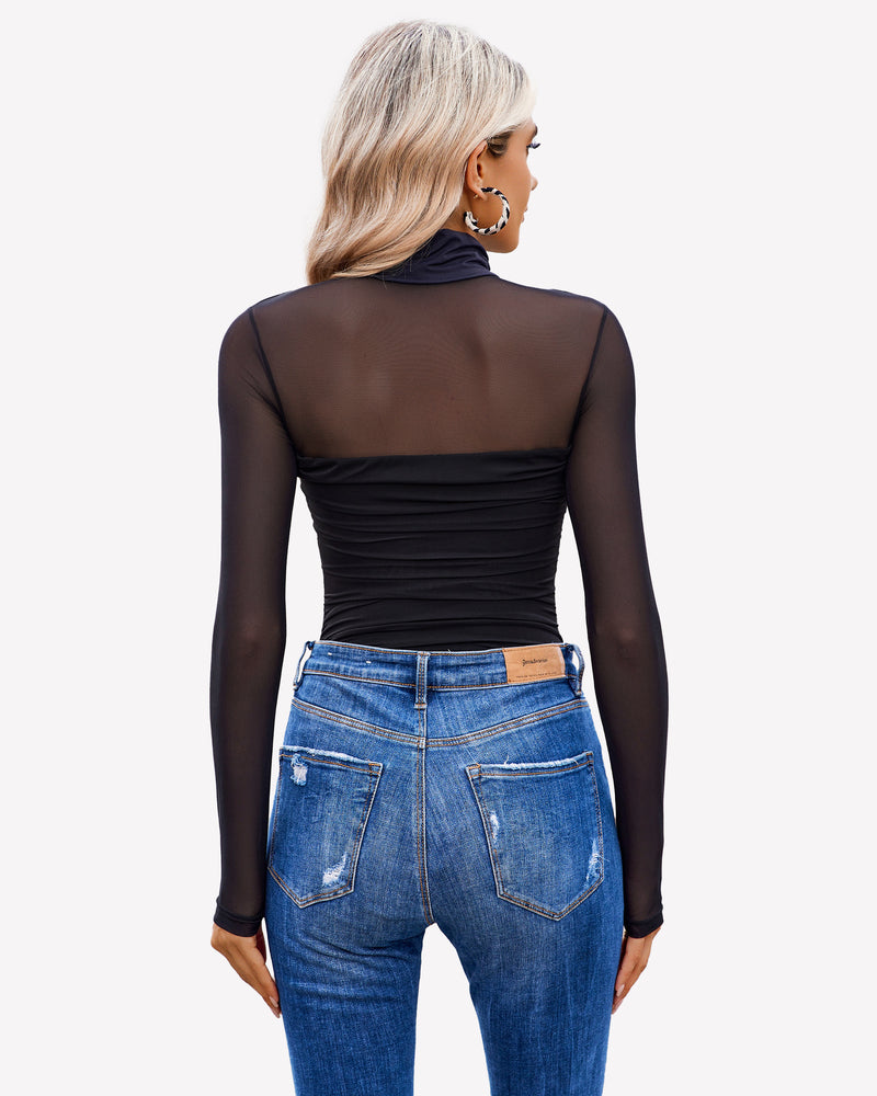 Black mesh bodysuit with mesh sleeves and blue jeans, perfect going out outfit for women.