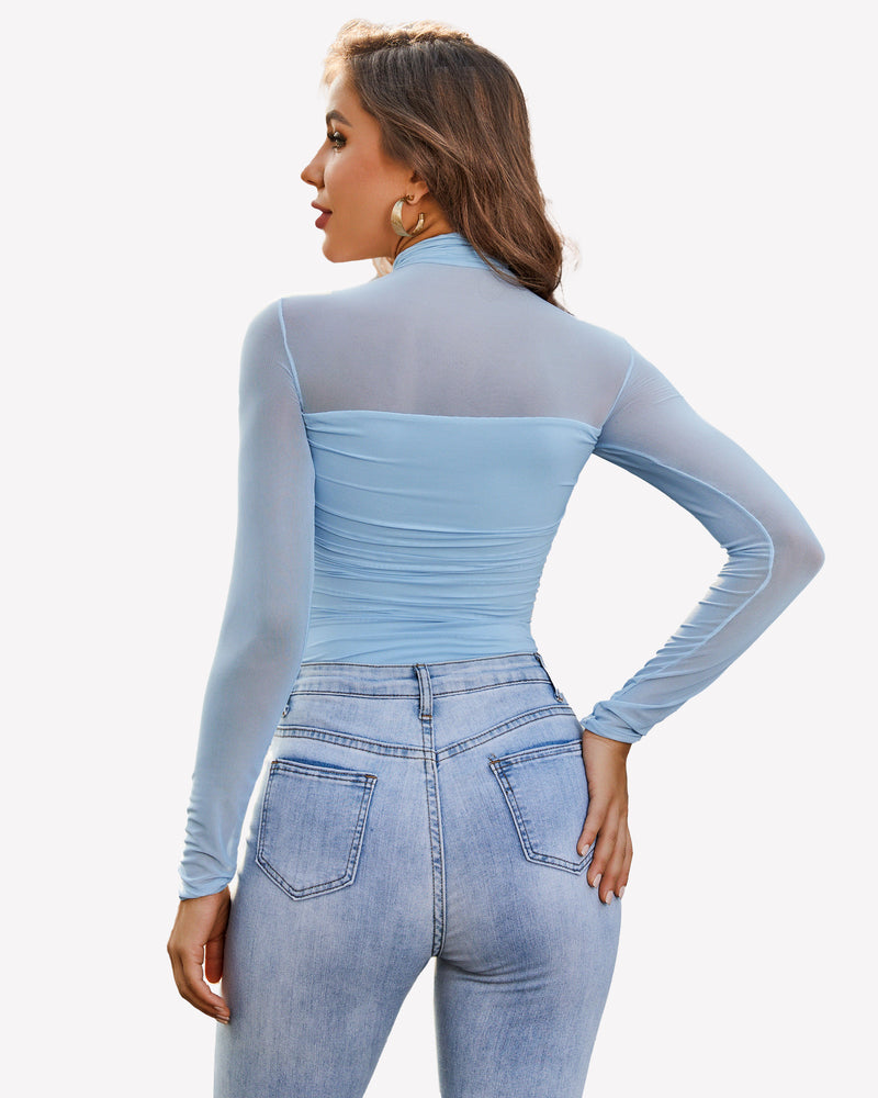 Light blue mesh turtle neck bodysuit and blue jeans, perfect for going out.