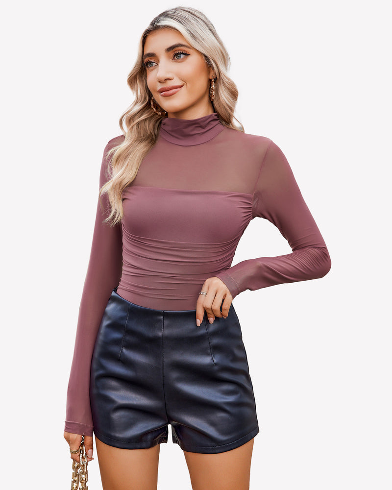 Mauve mesh turtleneck bodysuit with ruched front and black shorts. Going out outfit.