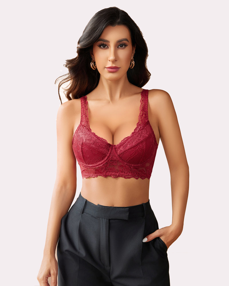 Ruby red lace underwire bralette, floral design, paired with dark gray trousers. Sexy lingerie.