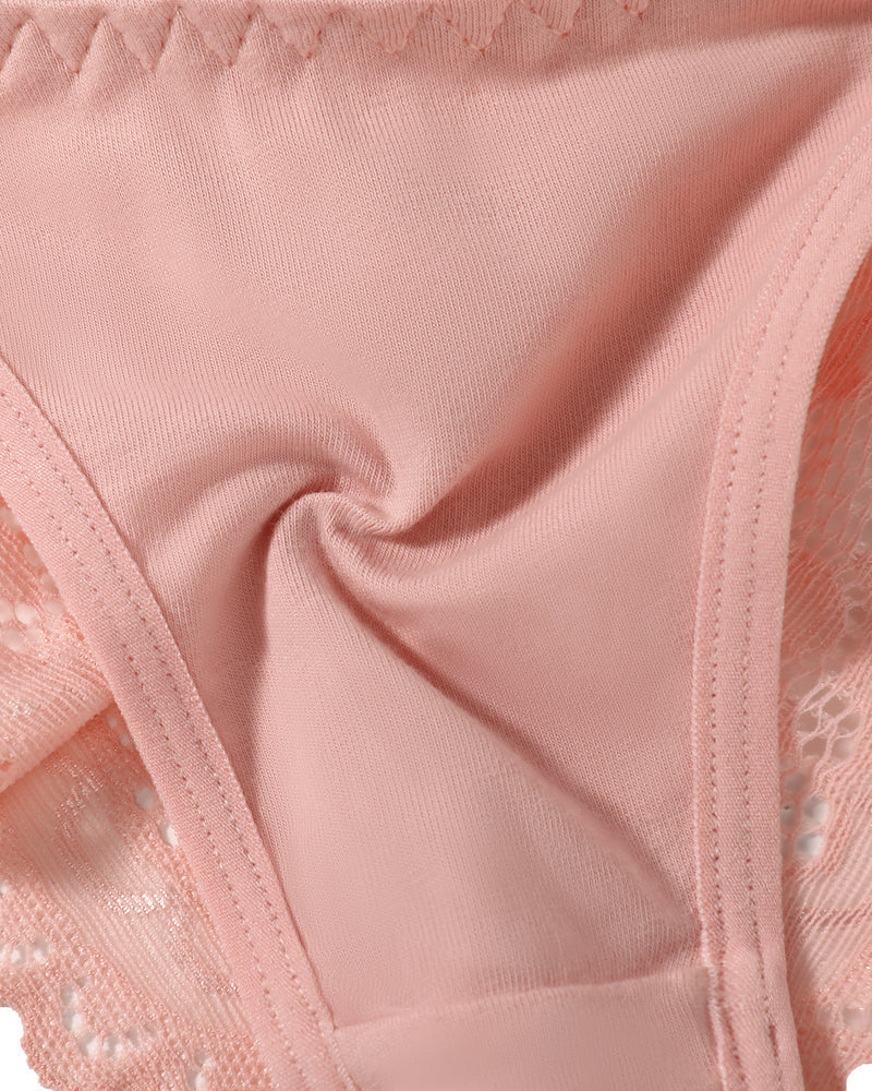 Pink string panty with lace trim. Low-rise cheeky design. Soft, charming lingerie for women.