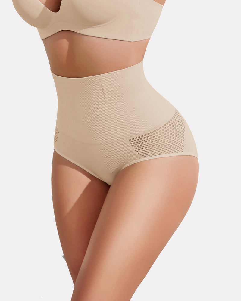 Beige high-waisted tummy control shapewear panty with mesh detail creating a slimmer curve for women