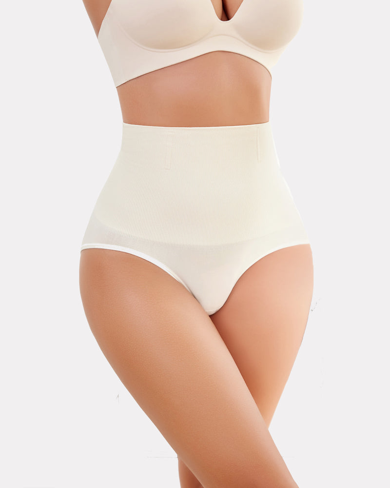 Beige high-waisted tummy control shapewear for enhanced curves and a smooth silhouette