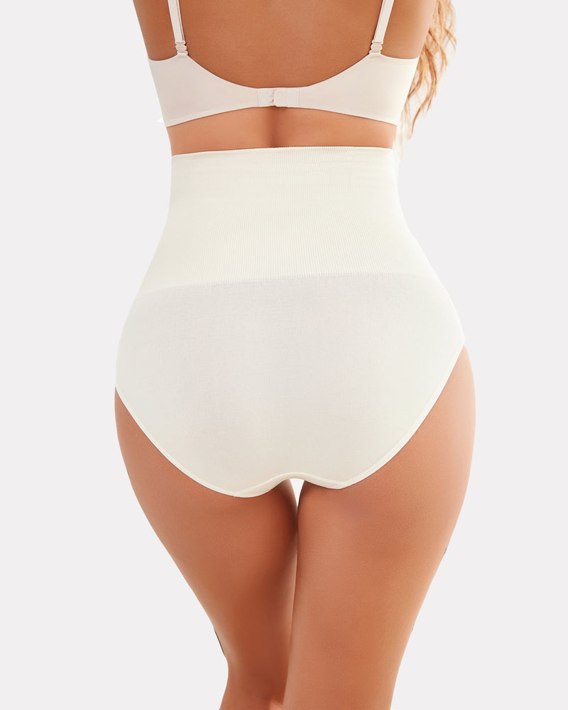 Beige high-waisted tummy control shapewear, smoothing the silhouette and enhancing curves