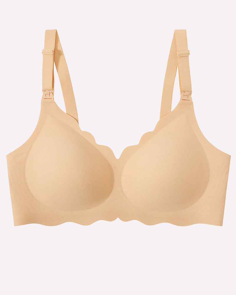 Seamless beige nursing bra with adjustable straps and easy nursing access.