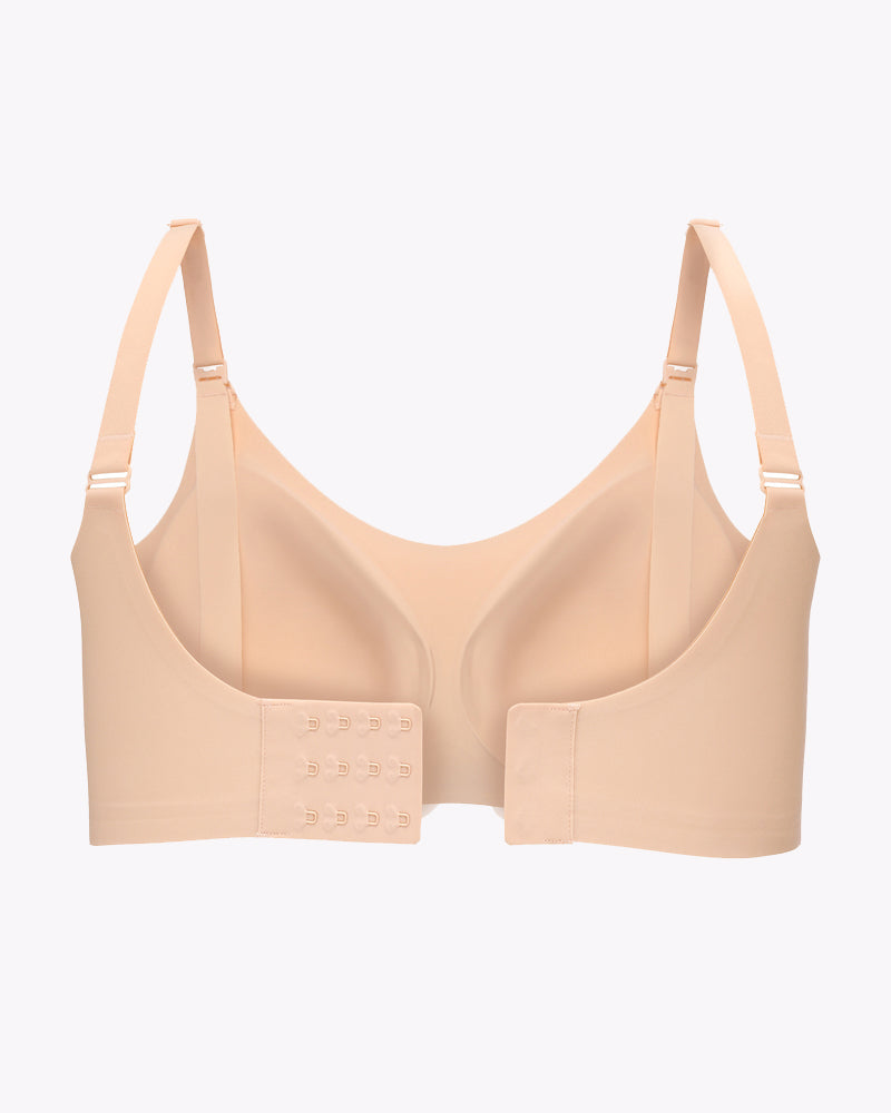 Beige seamless maternity nursing bra, featuring adjustable straps and comfortable support for moms.