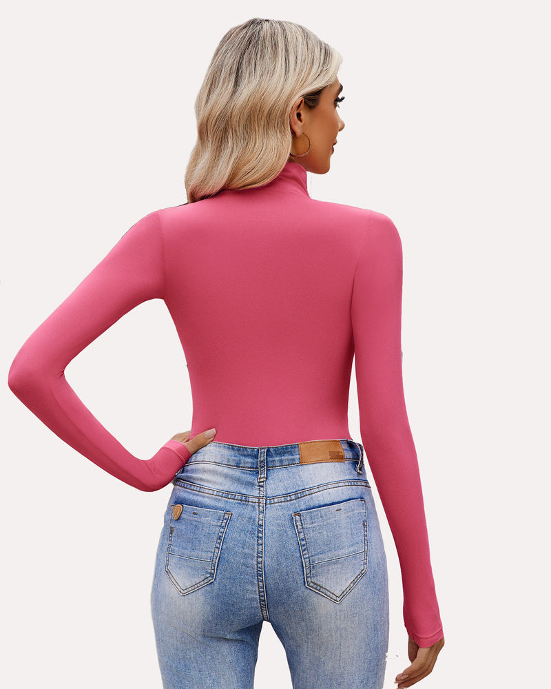Fuchsia high-neck long sleeve bodysuit shapewear paired with denim jeans, a stylish look.