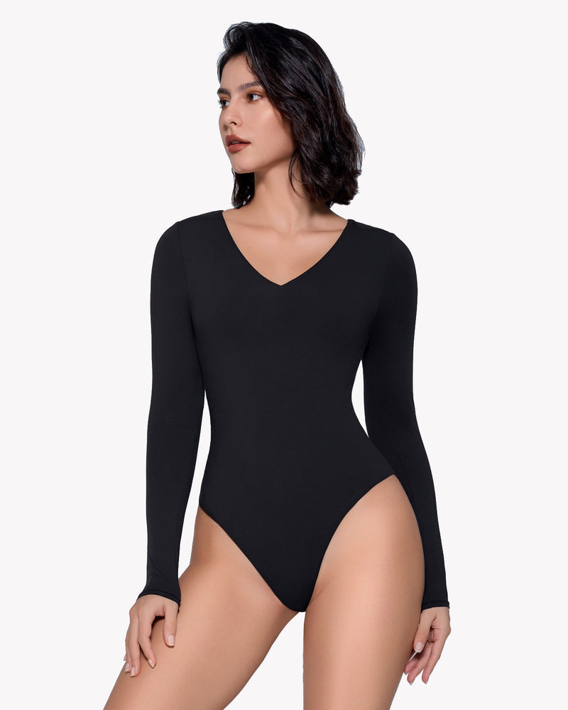 Black long-sleeve V-neck bodysuit. Buttery soft material, enhancing curves for a sleek, classy look