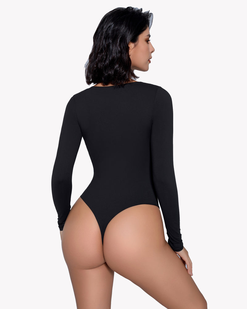 Black long-sleeve V-neck bodysuit. Sleek design, enhancing curves, confident, classy. Available now.