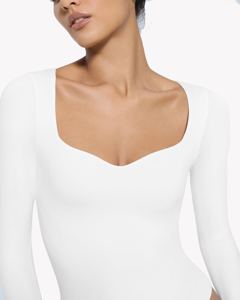 White sweetheart neckline long sleeve bodysuit shapewear. Premium comfortable design for shaping.