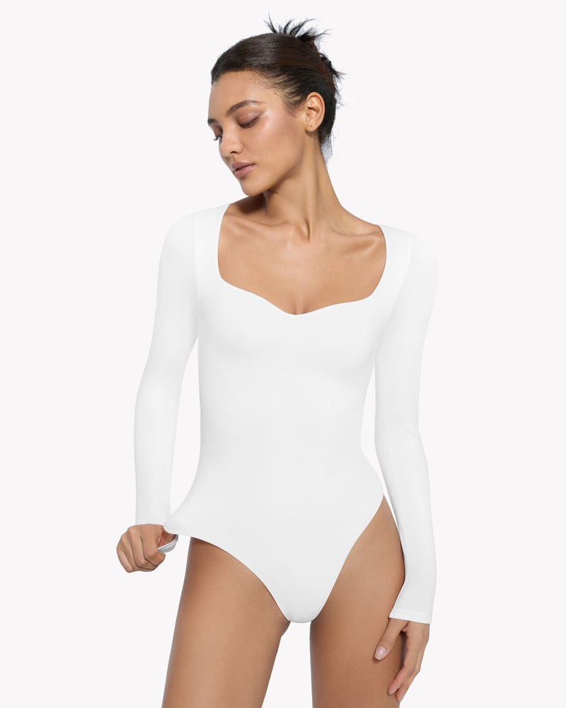White sweetheart neckline long sleeve shapewear bodysuit. Comfortable and shaping design.
