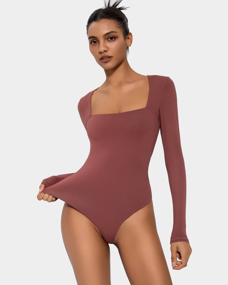 Terracotta square neck bodysuit with long sleeves. Elegant and flattering shapewear.