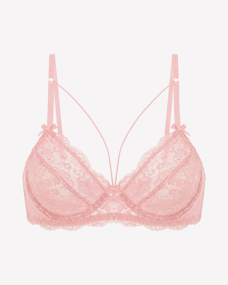 Pink lace unlined strappy bra with underwire support and see-through design. Sexy lingerie.