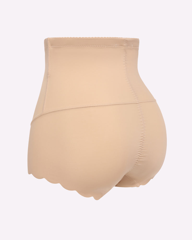 High-waisted nude shapewear with tummy control, seamless design, smooth effect, and scalloped edge.