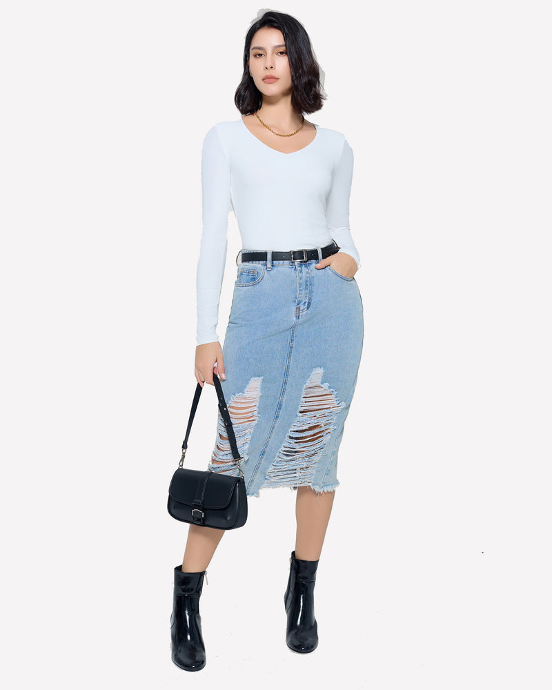White V-neck long sleeve top with blue denim skirt. A stylish outfit for a modern look.