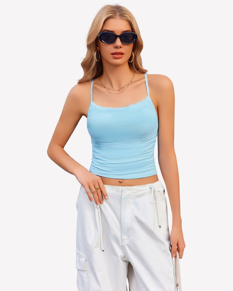 Light blue ruched cowl neck camisole and white cargo pants. Stylish outfit.