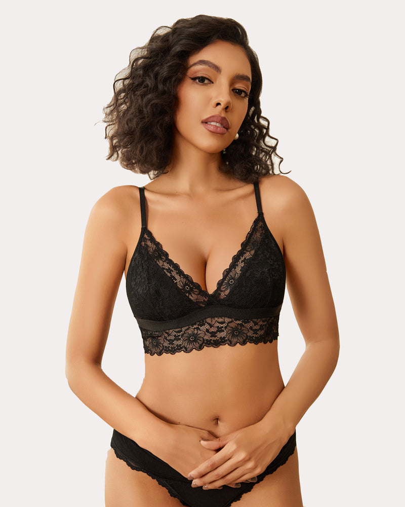 Black lace bralette, wireless and non-padded, paired with matching underwear for a sexy look.