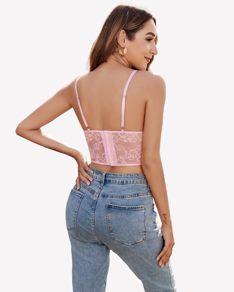 Pink lace corset top with adjustable straps, floral lace, paired with blue jeans