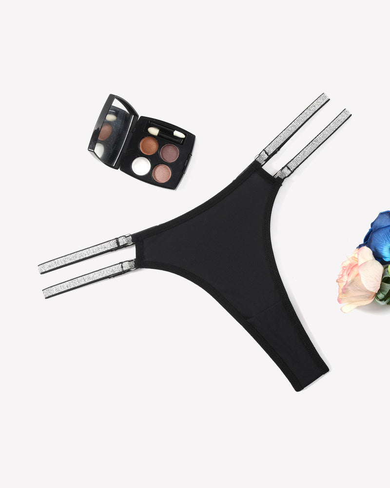 Black low waist Brazilian tanga panties with flashing straps and makeup, sexy lingerie