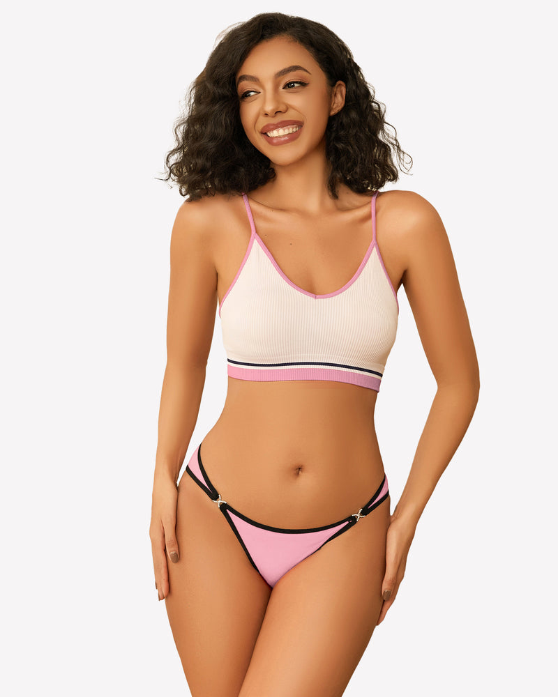 Pink low rise thong panty with rhinestone accents, white and pink trim bra, smiling woman