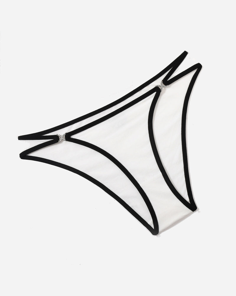 White sheer thong panty with black trim and rhinestone accents, low rise design, sensual lingerie.