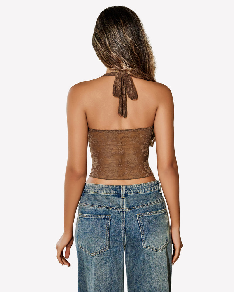 Brown lace Y2K halter top with open back, paired with jeans. Fashionable and comfortable.