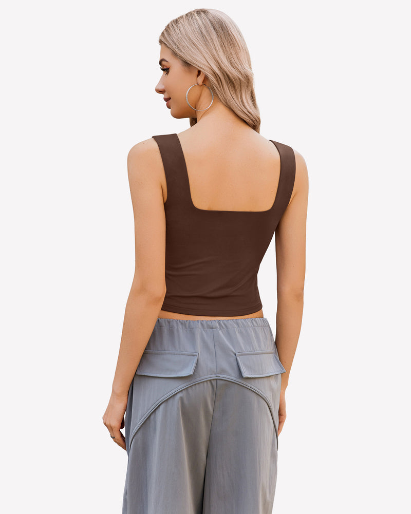 Brown backless crop tank top with square neck, Y2K style. Sleeveless slim fit, grey pants.
