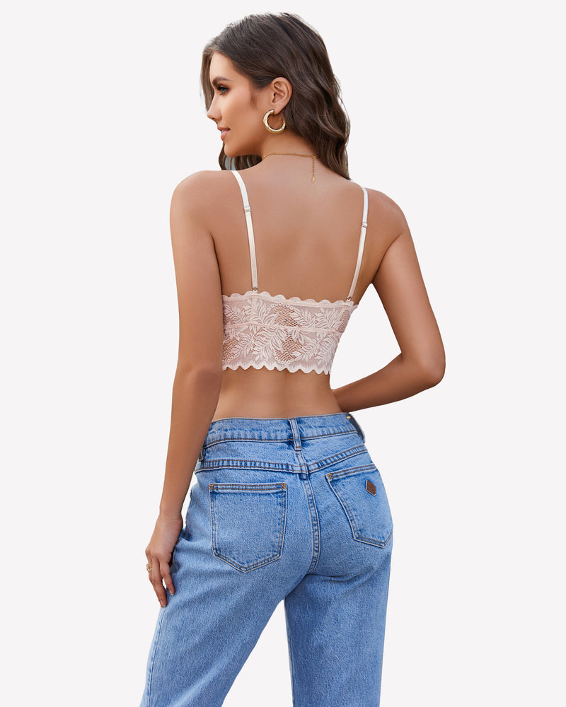 Pink lace Y2K camisole tank top with adjustable straps and light-wash jeans. Floral lace detail.