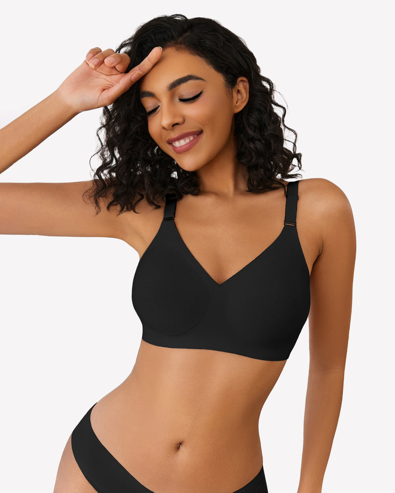 Black wireless push up bra, V-neck, full coverage, seamless smoothing, model smiling