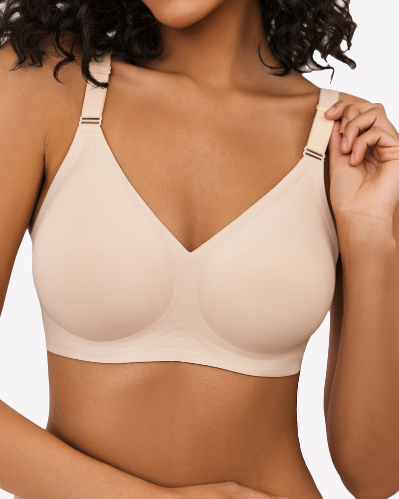 Beige wireless push up bra with V-neck, full coverage, and seamless smoothing, model adjusting strap