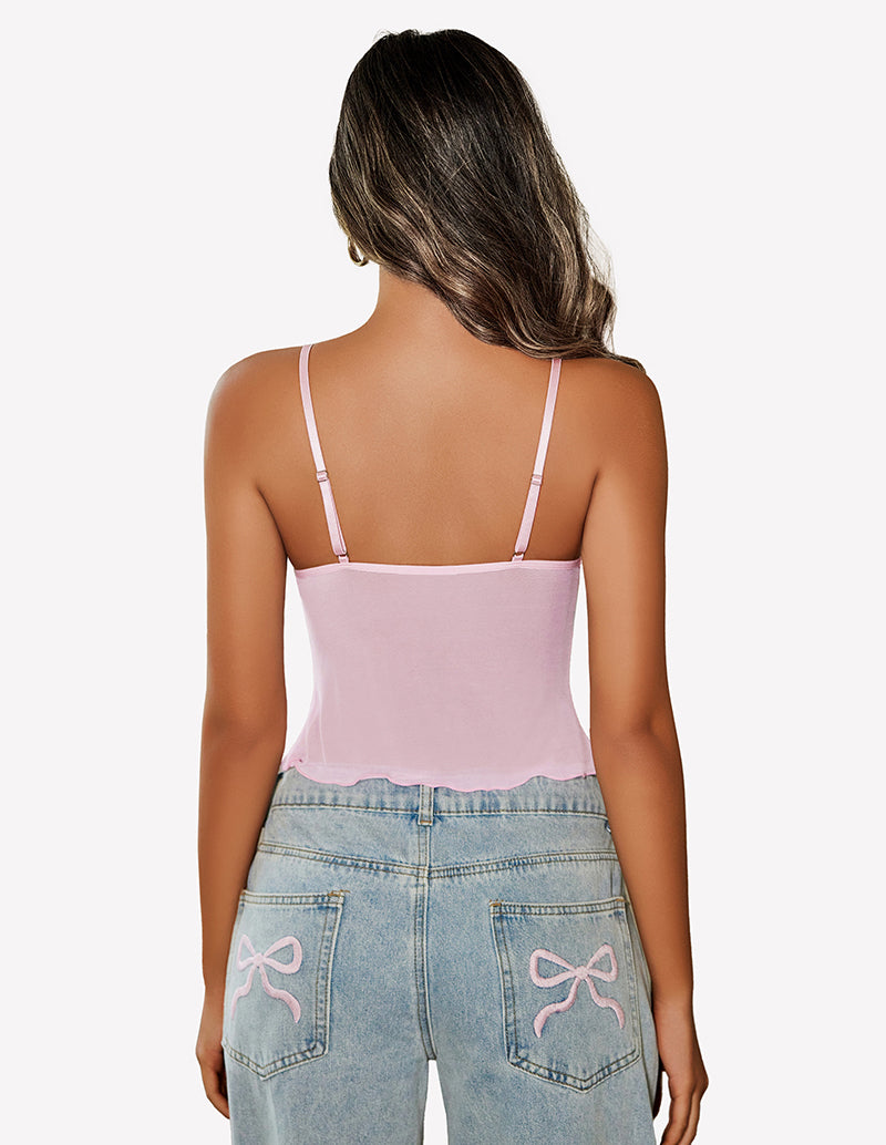 Pink mesh crop top with adjustable straps and Y2K jeans. Summer fashion outfit