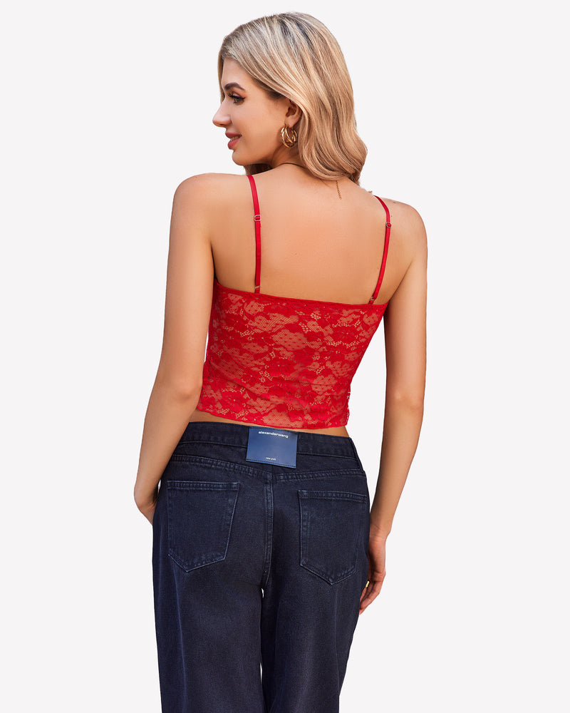 Red lace cami top with thin straps and dark-wash jeans. Y2K style cami top.