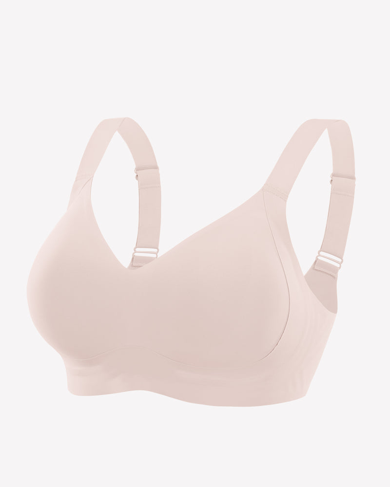 Seamless blush pink bra. Smooth, comfortable fit. Adjustable straps, no underwire, silky feel.