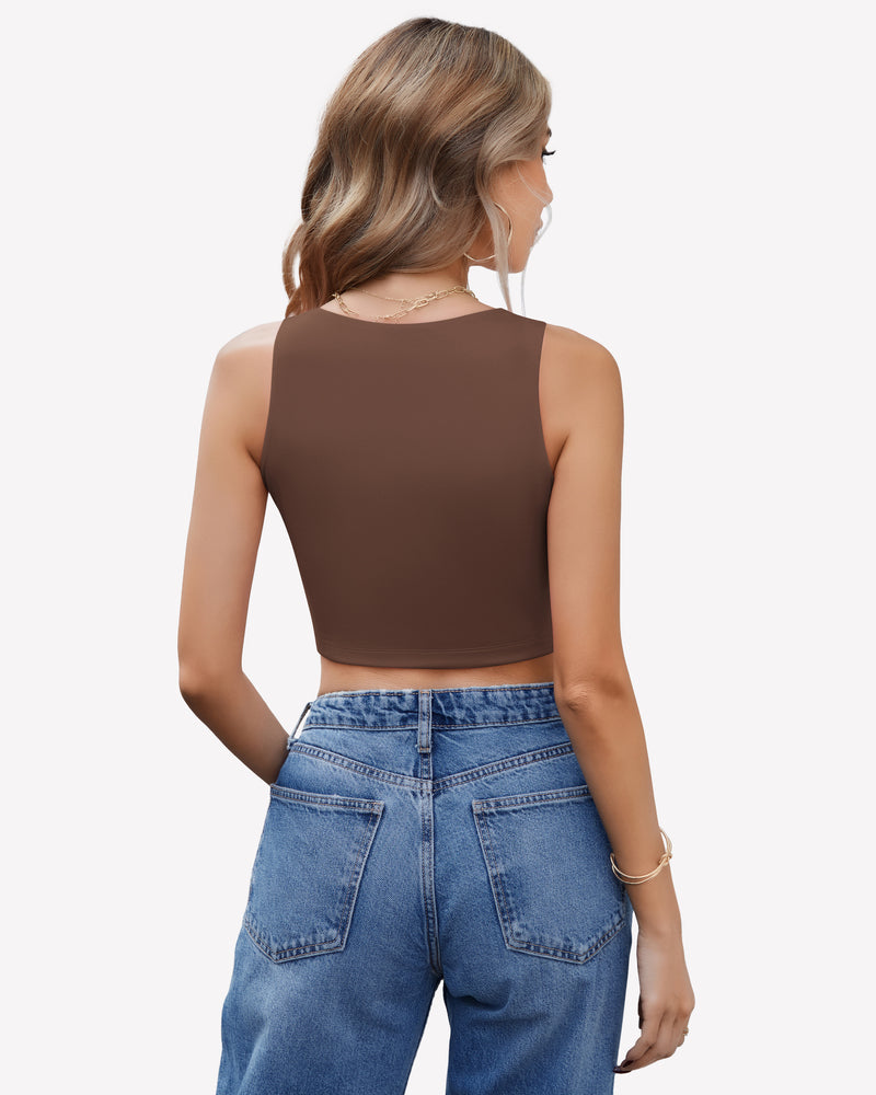 Brown double-lined crop top with mock neck paired with blue jeans. Trendy and effortless style.
