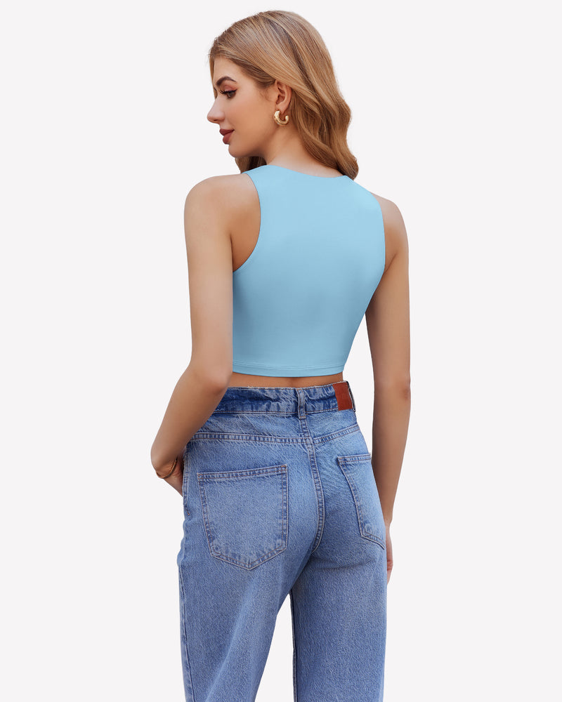 Light blue racerback crop top and blue jeans. Trendy and effortless style.