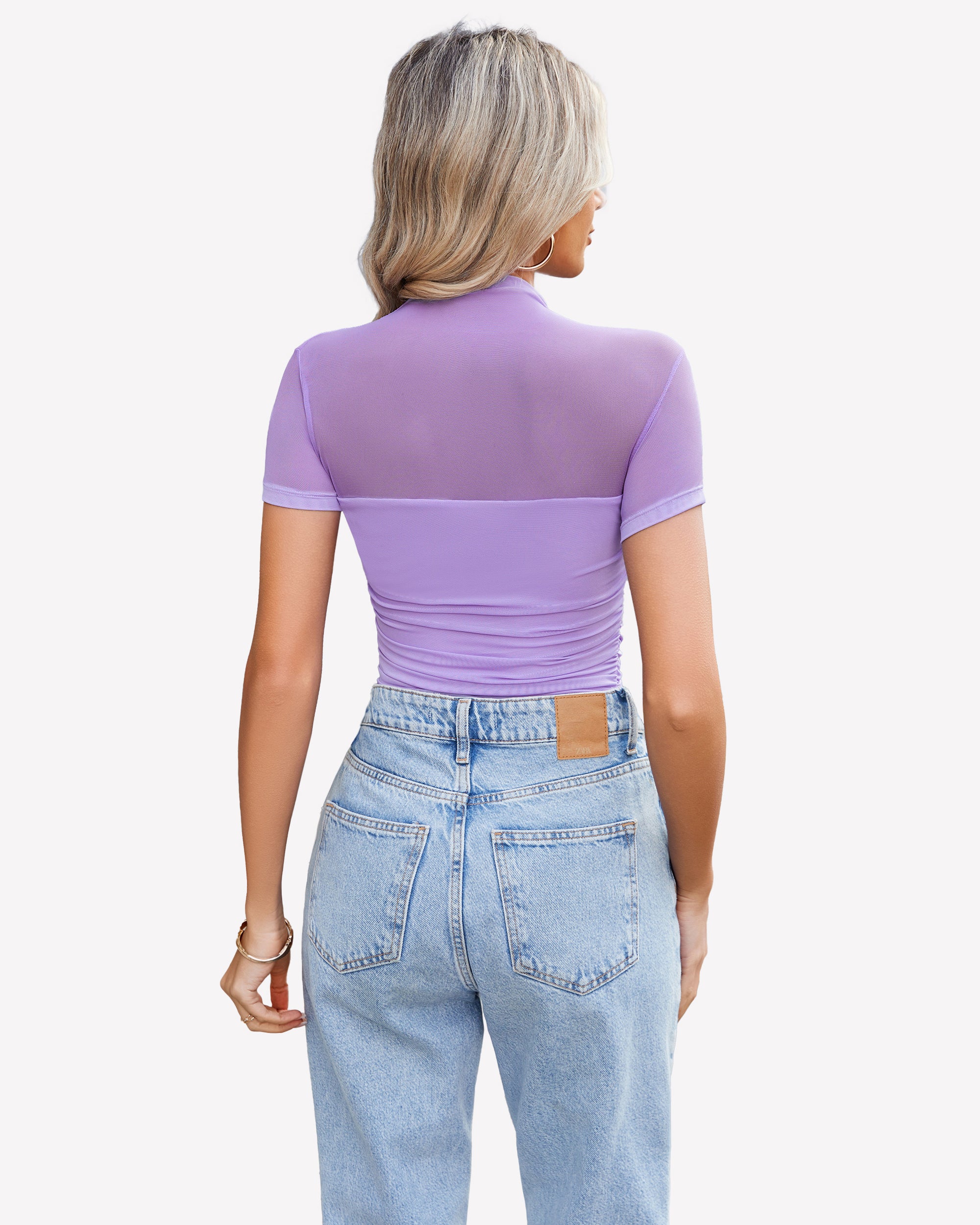 Mesh short sleeve bodysuit with turtle neck and blue jeans, elegant going out outfit