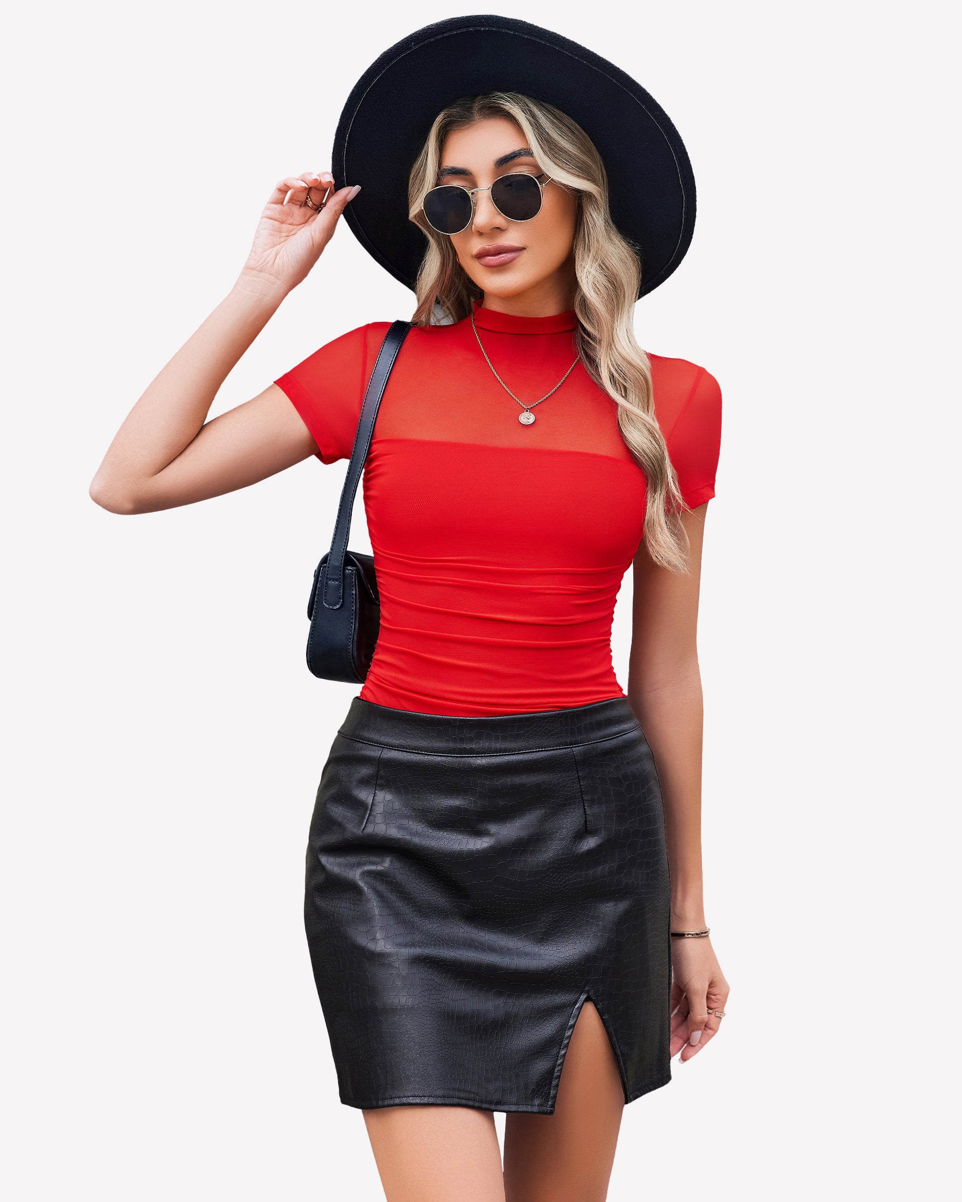 Red mesh bodysuit with turtle neck, black skirt, and hat, perfect going out outfit