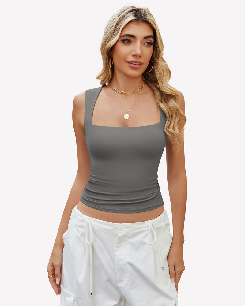 Gray square neck crop top, sleeveless, with white pants, a versatile summer outfit.