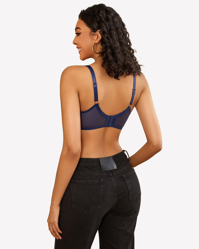 Navy blue push-up bra with adjustable straps and black jeans. Comfortable and confident.