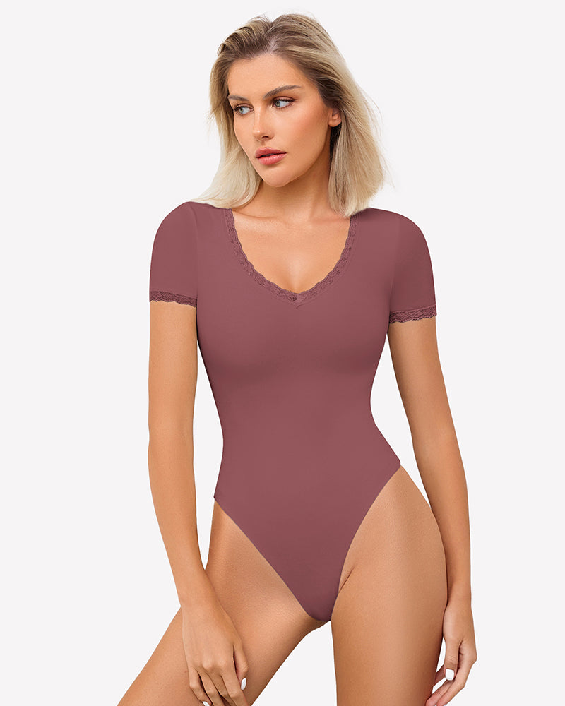 Mauve V-neck bodysuit with lace trim, perfect for everyday wear and light smoothing effect.
