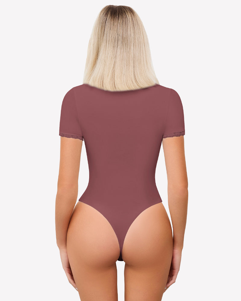 Mauve short sleeve bodysuit with lace trim, offering light smoothing and a flattering fit.