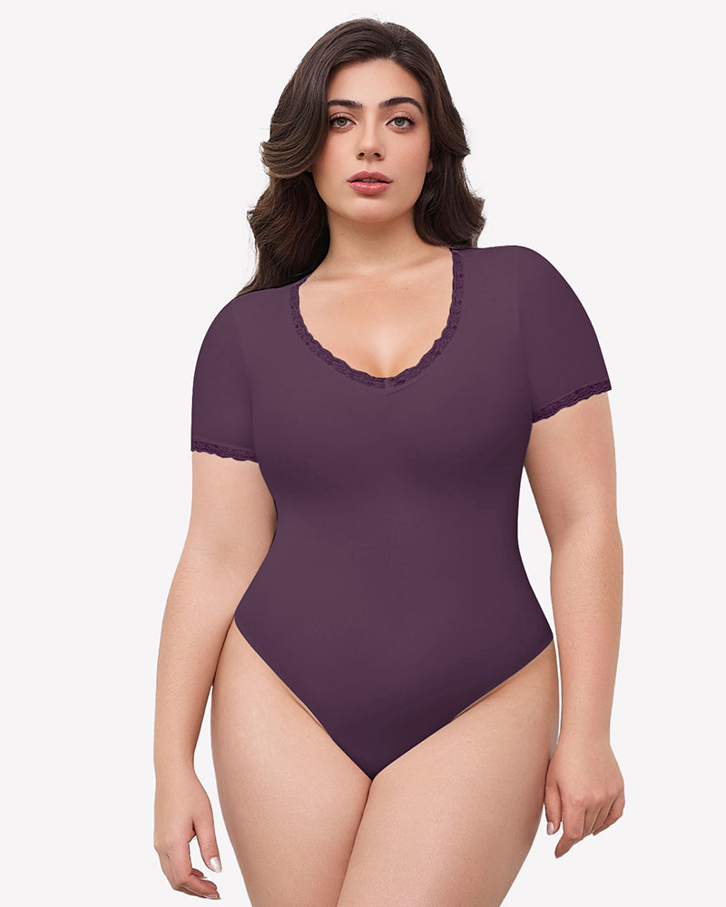 Mauve short sleeve V-neck bodysuit with lace trim, light smoothing effect and flattering fit.
