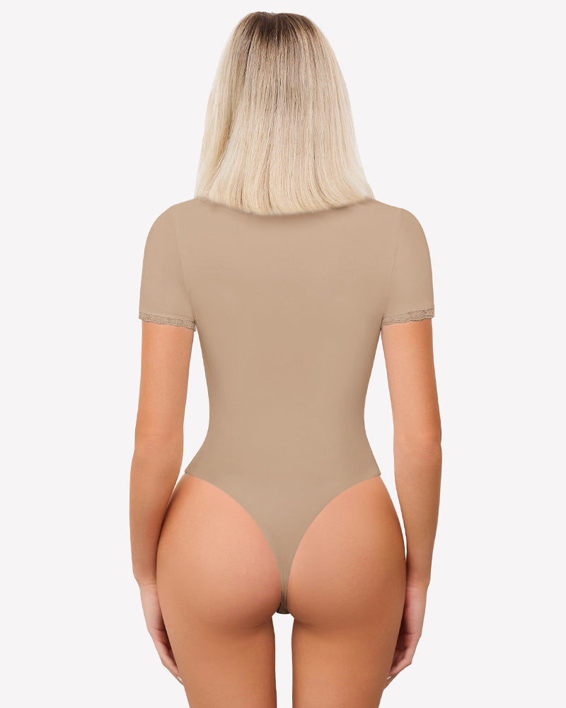 Beige short sleeve V-neck bodysuit with lace trim, light smoothing effect, flattering fit.