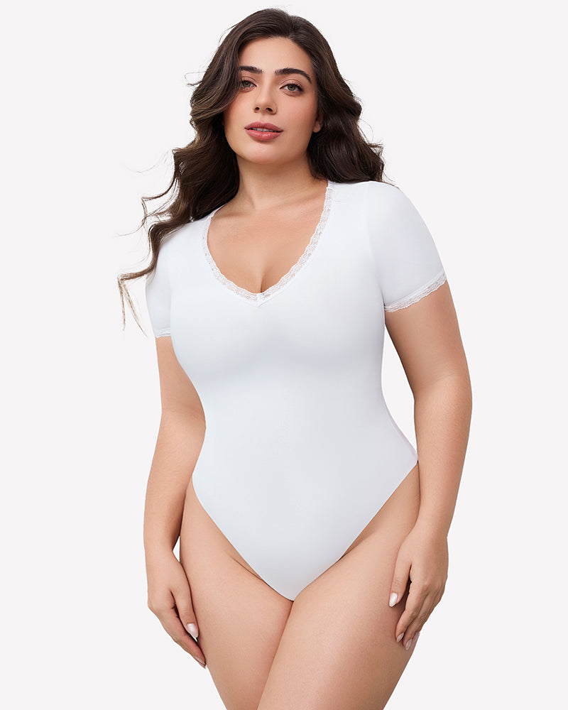 White V-neck bodysuit with lace trim, short sleeve, light smoothing effect and flattering fit.