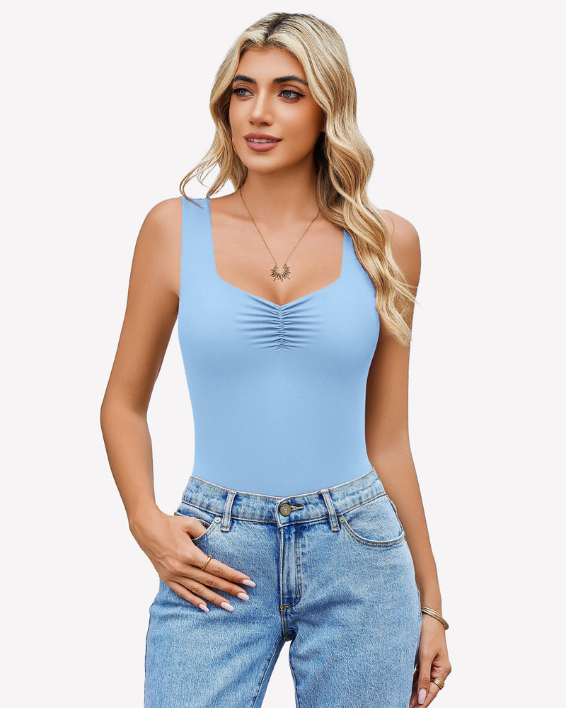 Sweetheart neckline bodysuit in light blue, paired with denim jeans, perfect for everyday wear.